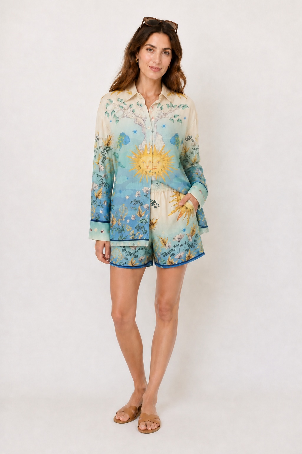 Anastasia Set by Agua Bendita, celestial print button-down shirt and shorts styled with flat slides