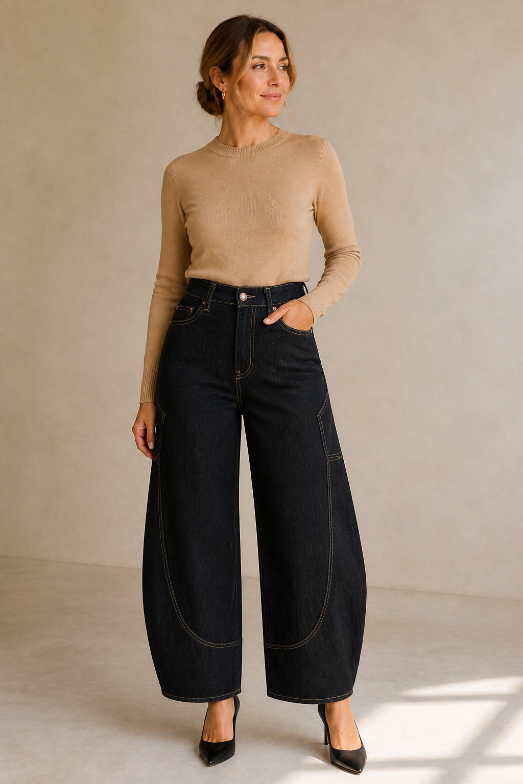 Berlin Barrel Jeans in black, high-waisted horseshoe barrel-leg jeans, front view - Revelle Toronto