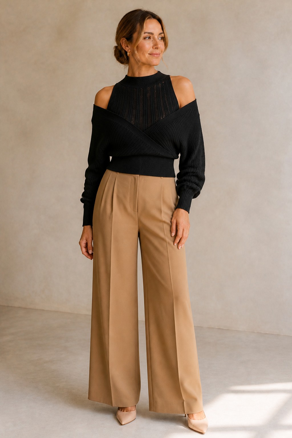 Oslo Cut-Out Knit Top in black, cut-out shoulders and crossed front, front view - Revelle Toronto